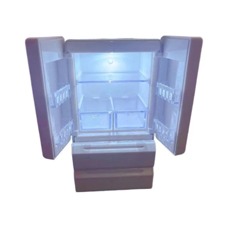 White plastic miniature candy shop model with internal light turned on, showing detailed interior.