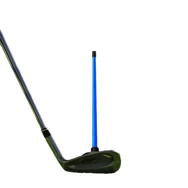 Red aluminium alloy golf swing trainer with magnetic baseball bar alignment tool on a green background.