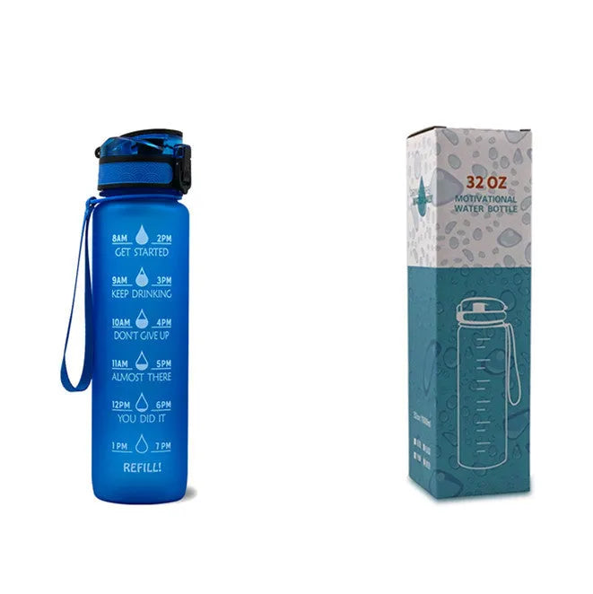 Blue-red gradient 1L Tritan water bottle with time markers and flip-top lid on a gym bag