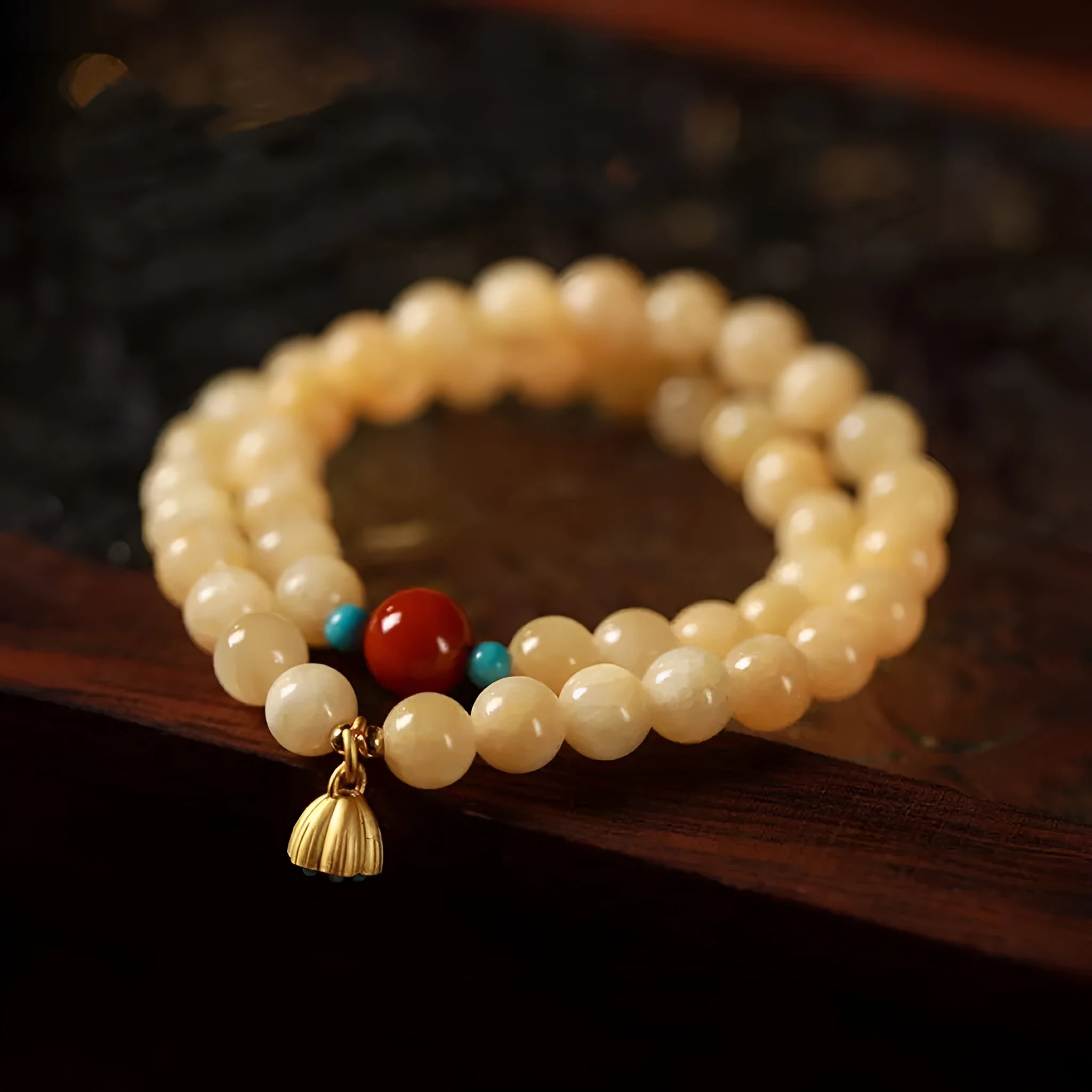 Yellow jade handmade bracelet with lotus seedpod design and double ring structure