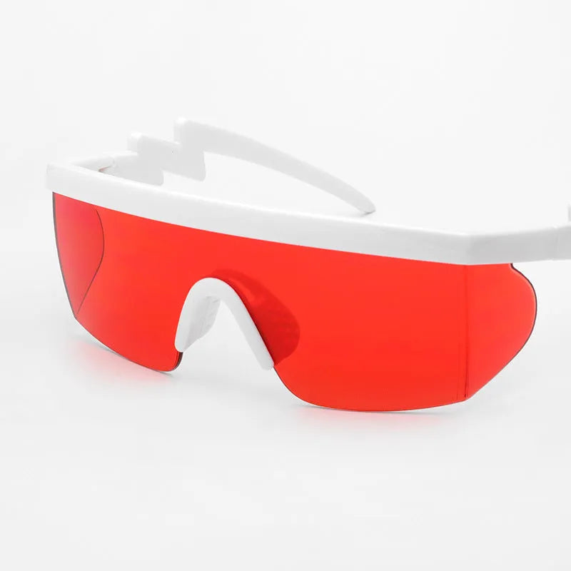 Sports sunglasses with curved foot piece design and colourful lens options