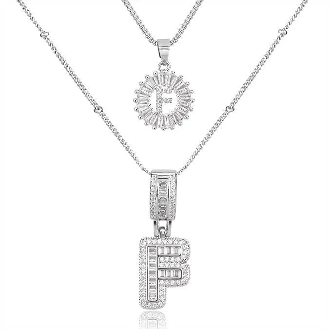 26 English letters copper-plated gold diamond initial pendant necklace with adjustable chain on display