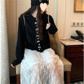 Women's acrylic cardigan with bow detail and pearl button in solid colour