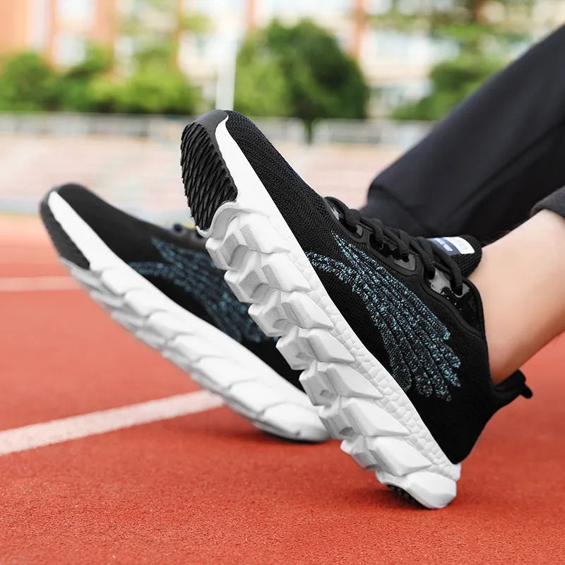 Black and white platform running sneakers with round toe and cross strap details