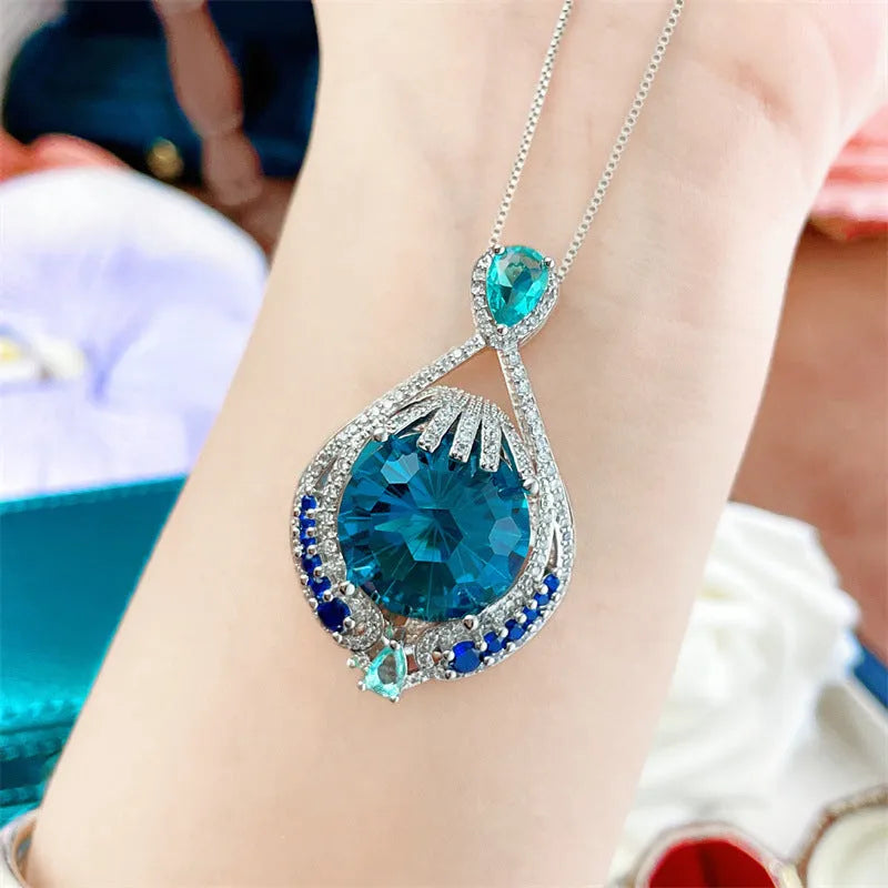 Blue fireworks cut gemstone geometric pendant necklace with water wave chain