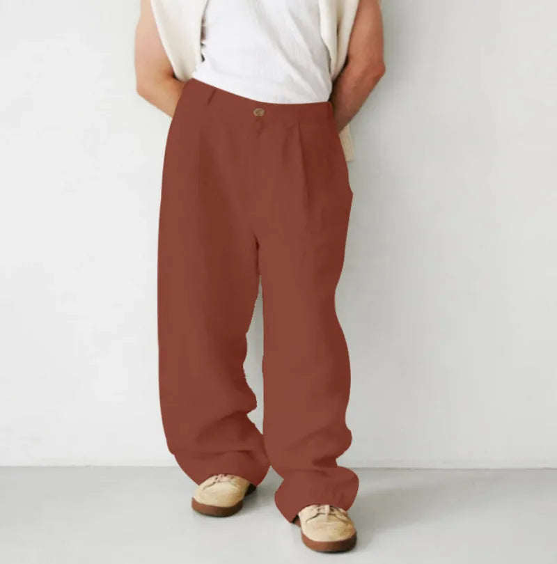 Men's loose linen jogger pants with high waist pleating and straight leg styling in multiple colour options