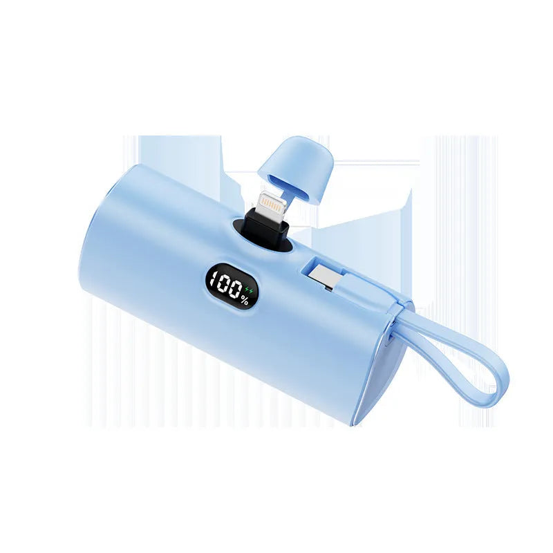 Capsule-shaped wireless power bank with digital display, shown in multiple colour options.