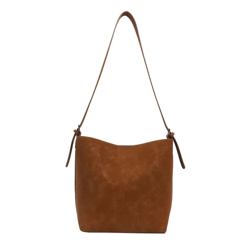 Versatile retro matte women's single-shoulder large-capacity bucket bag in brown, black, and coffee PU leather