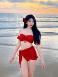 Red women's bikini swimsuit with puff sleeve top and briefs-style pants