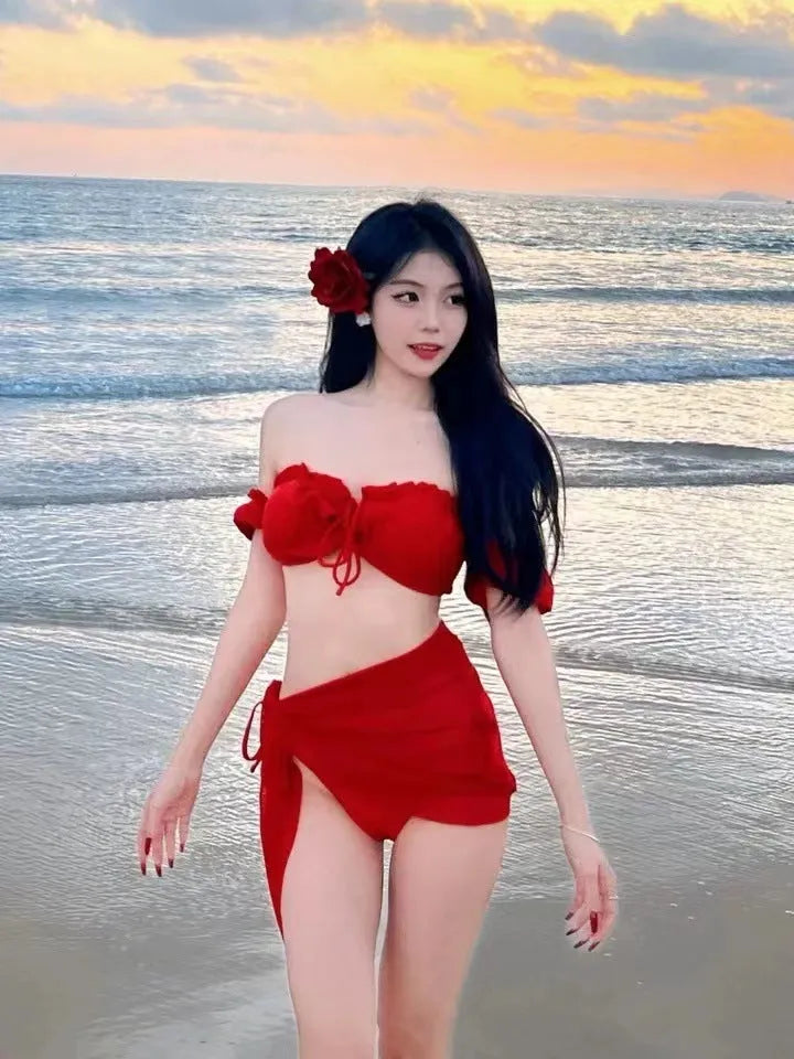 Red women's bikini swimsuit with puff sleeve top and briefs-style pants