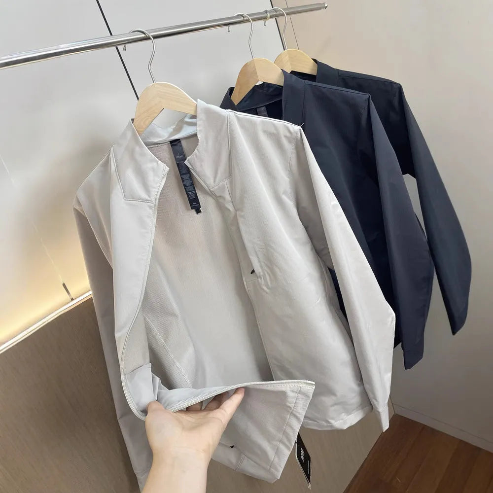 Man wearing a stand collar straight hem casual sports jacket in polyester fabric.