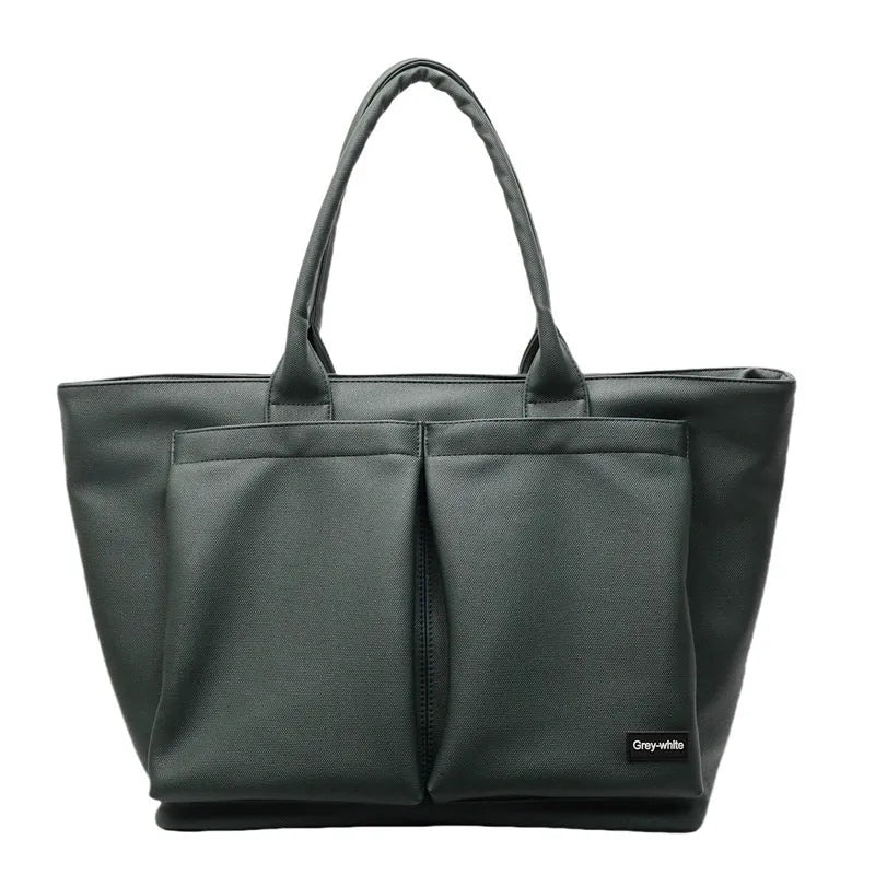 Lightweight PU shoulder bag in black, green, or white with 20-35 litre capacity