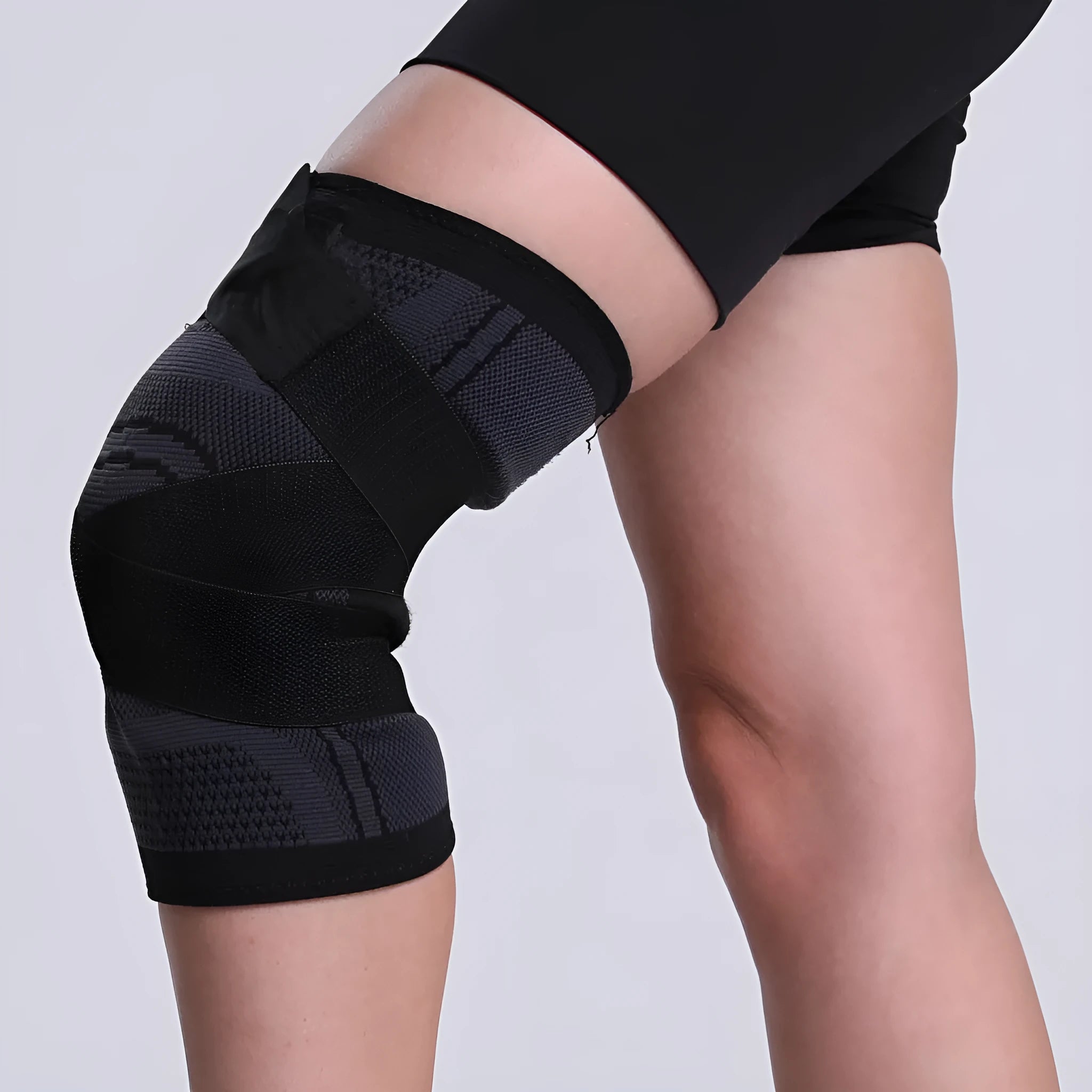 Nylon knitted knee pad in red, breathable sports support, available in multiple sizes.