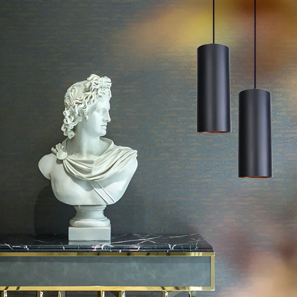 Retro black iron chandelier with multiple light arms hanging from a ceiling