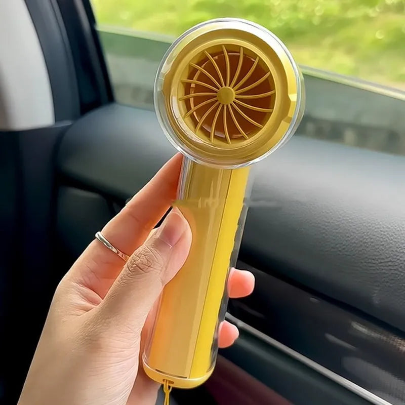 Portable handheld fan with refrigeration function in black, white or yellow colours showing compact design