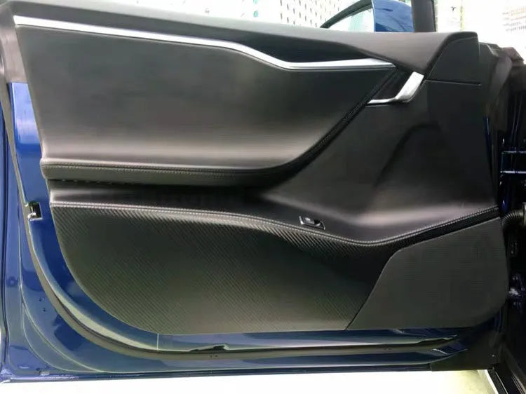 Four pre-cut carbon fibre protective films for Tesla Model S interior door control layouts.