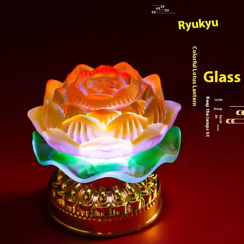 A yellow Chinese-style lotus Buddha lamp made of ABS plastic on a wooden surface.