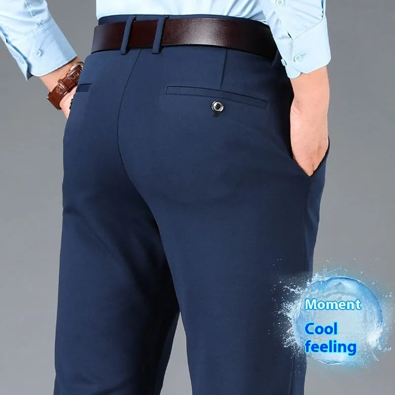Men's straight-leg suit trousers in black elastic fabric, shown on a hanger.