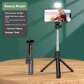 Mobile phone Bluetooth selfie stick tripod with self timer extended to 70cm on a white background in black colour