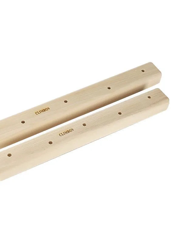 Set of three solid wooden hangboards for grip and finger strength training, shown in different sizes.