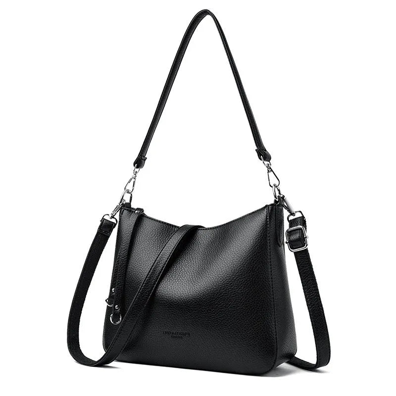 Genuine leather horizontal square shoulder crossbody bag with metal belt detail in beige colour