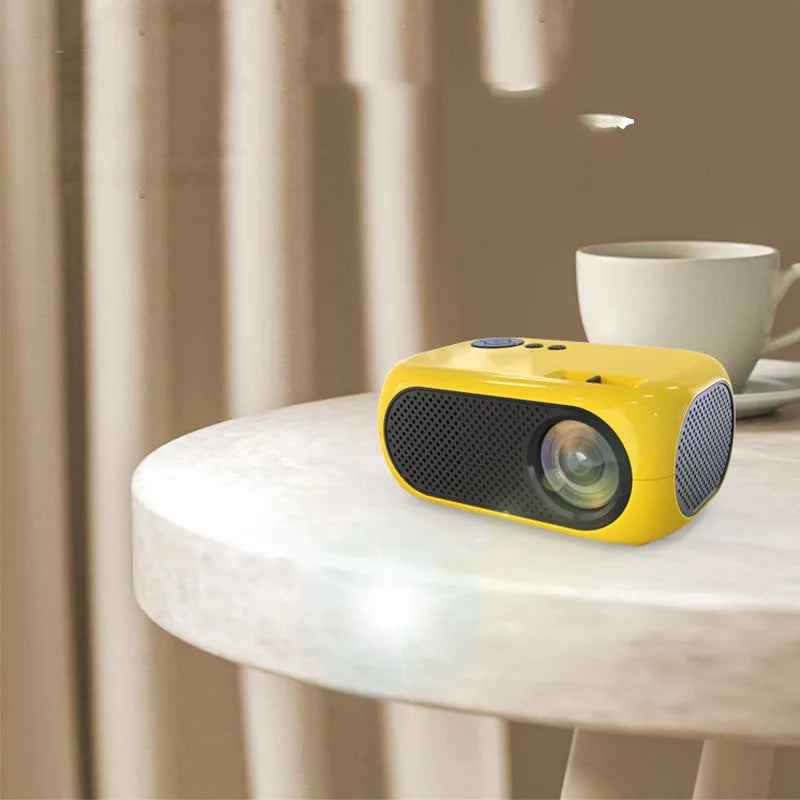 Compact M24 portable mini projector in gold or white finish with regional power adapters