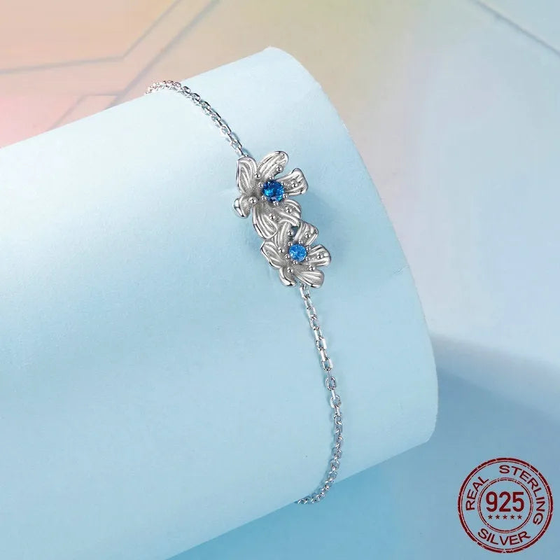 S925 silver flower bracelet with 160+50mm adjustable chain, 9x17mm floral pendant and 2.1g weight