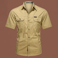 Men's short sleeve cotton work shirt in army green, showing loose fit and cardigan-style design.