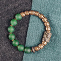 Retro ethnic style couples bracelet made of natural green and red agate beads on a string.