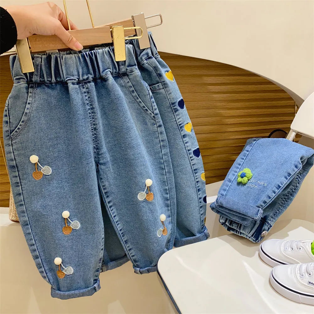 Girls Korean style harem jeans in embroidered cherry pattern, cotton denim, mid waist elastic waistband