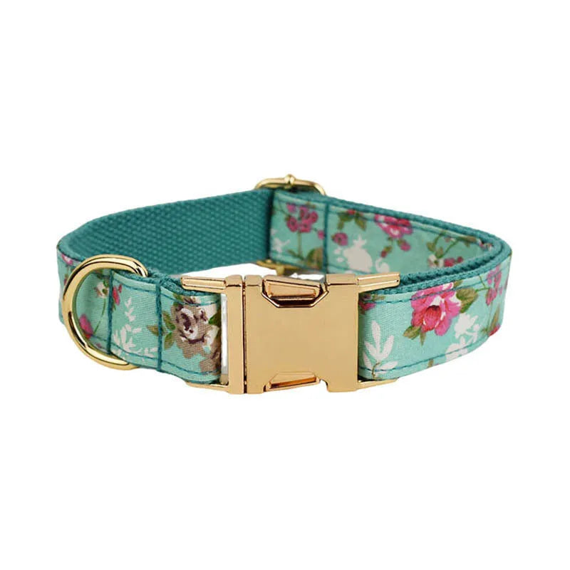 Fabric dog collar set with detachable green rose pattern bow, matching leash and vest