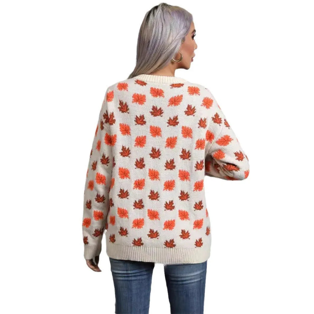 Women's maple leaf Christmas sweater in loose fit with contrast colour design, available in beige or dark green