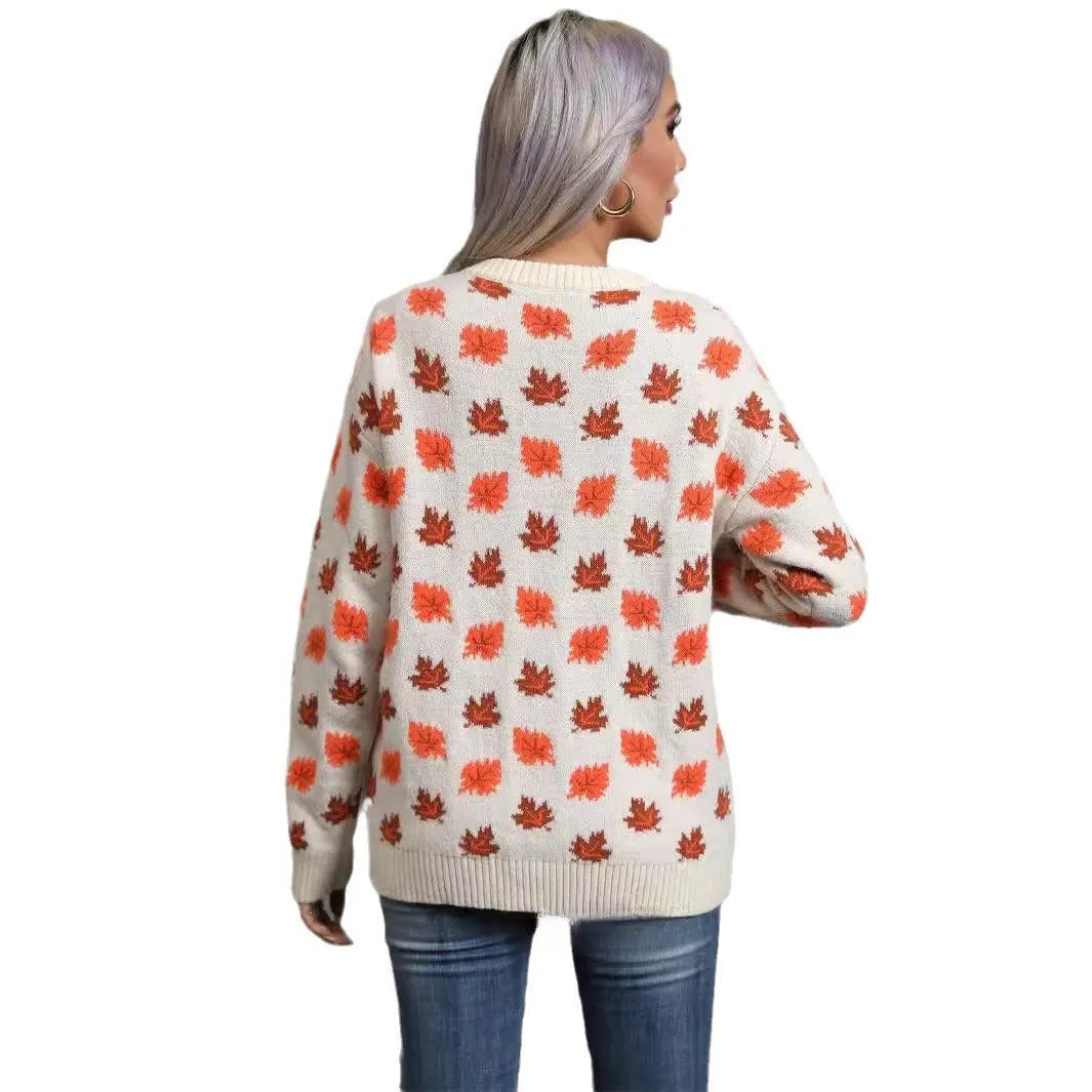 Women's maple leaf Christmas sweater in loose fit with contrast colour design, available in beige or dark green