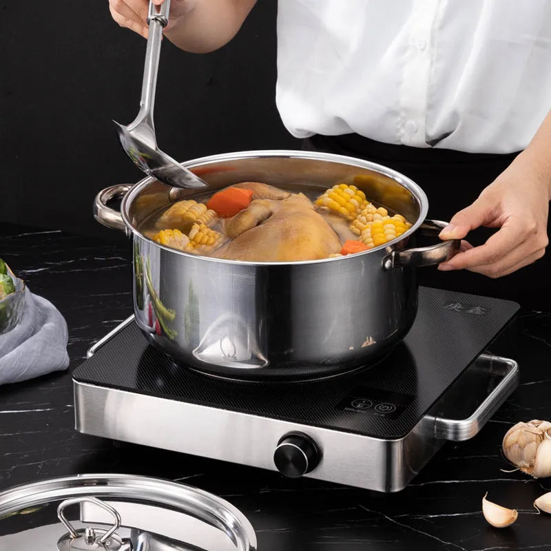 15-piece stainless steel cookware set with non-stick pans and glass lids on a kitchen counter