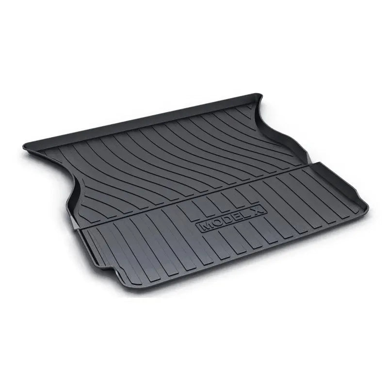 Rubber and TPE floor mat set for a Tesla car interior.