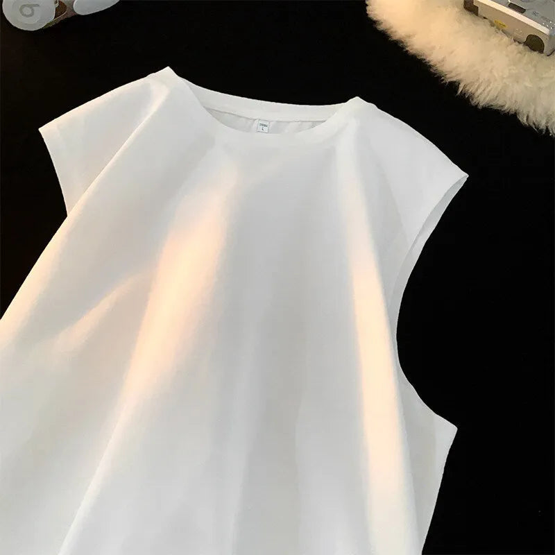 Men's loose solid colour cotton sleeveless tank top on a hanger, showing straight hem design.