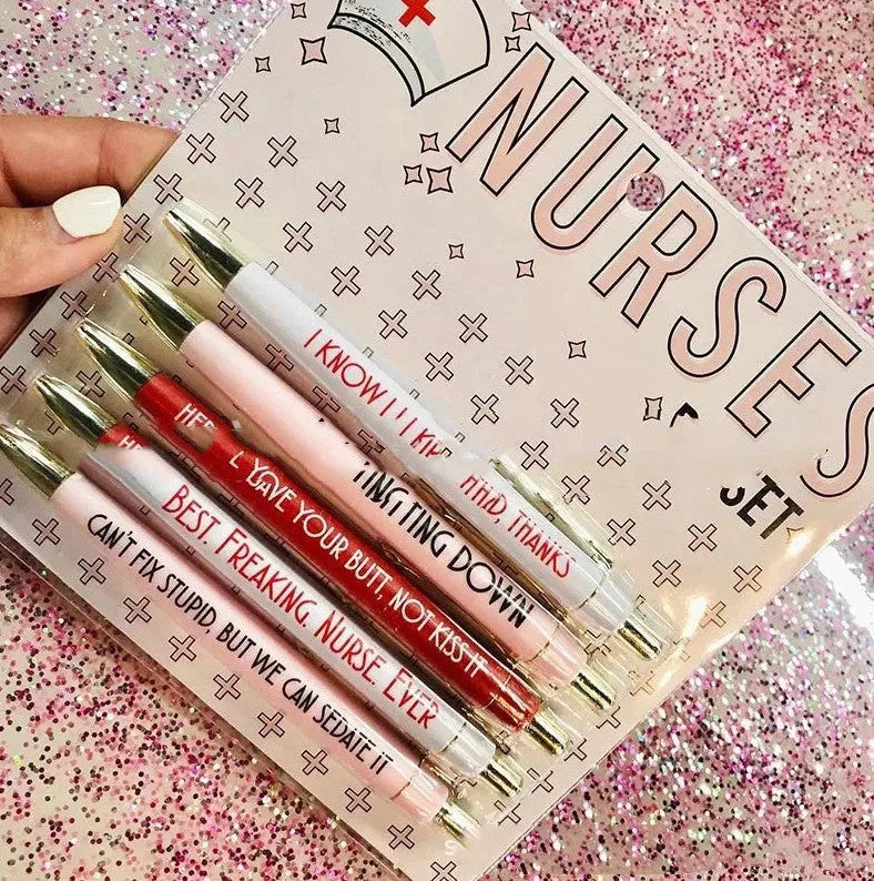 Five nurse-themed ballpoint pens with retractable mechanisms and printed medical copywriting