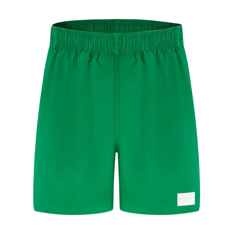Men's solid colour quick-drying nylon sports shorts in straight leg style