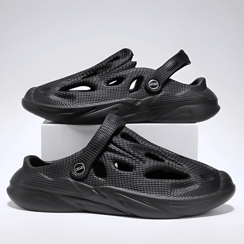 Men's breathable hollow-out EVA slippers in grey, flat heel, round toe, on a plain background