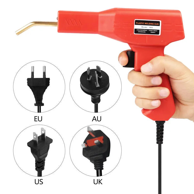 Red plastic welding gun with pure copper transformer in black plastic box with nails and pliers knife