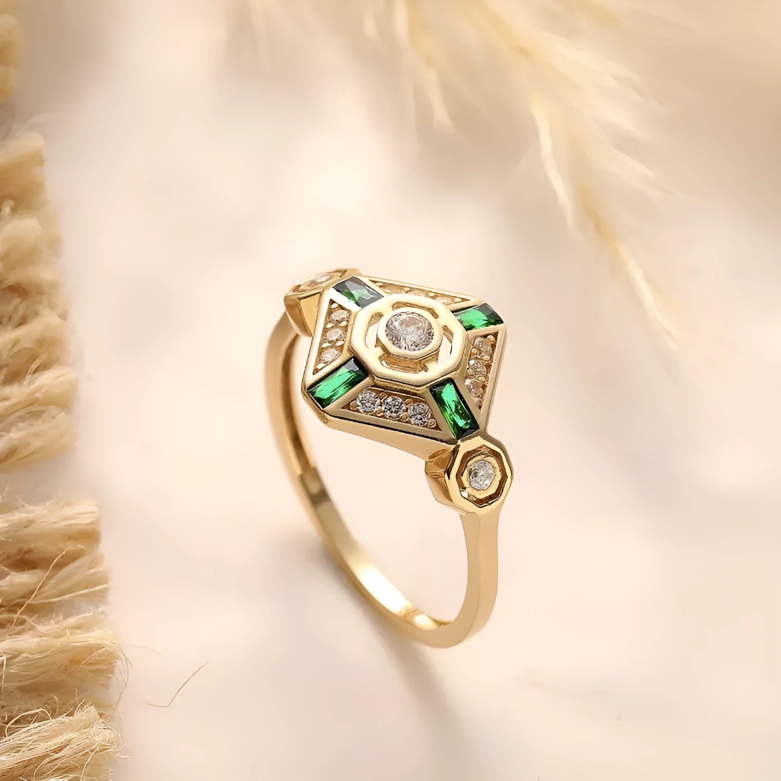 Ins style square emerald diamond ring in lvzuan colour on a white background.