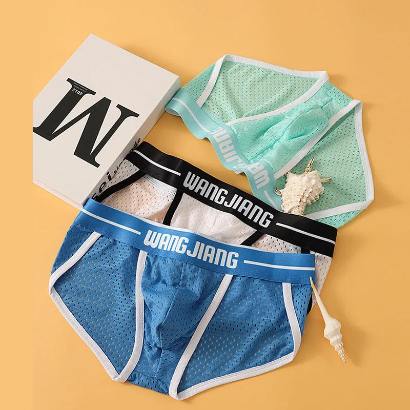 Men's triangle underwear in breathable ice silk mesh fabric, shown in solid colours including black, white, and blue.