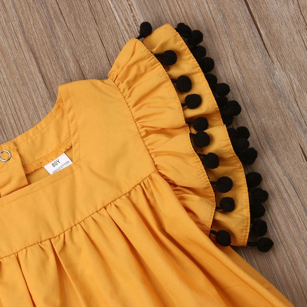 Orange sleeveless summer dress for girls available in sizes 12M through 5T