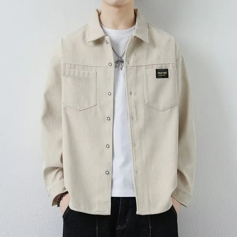 A man's long-sleeved corduroy cardigan jacket available in black, grey, khaki, and orange.