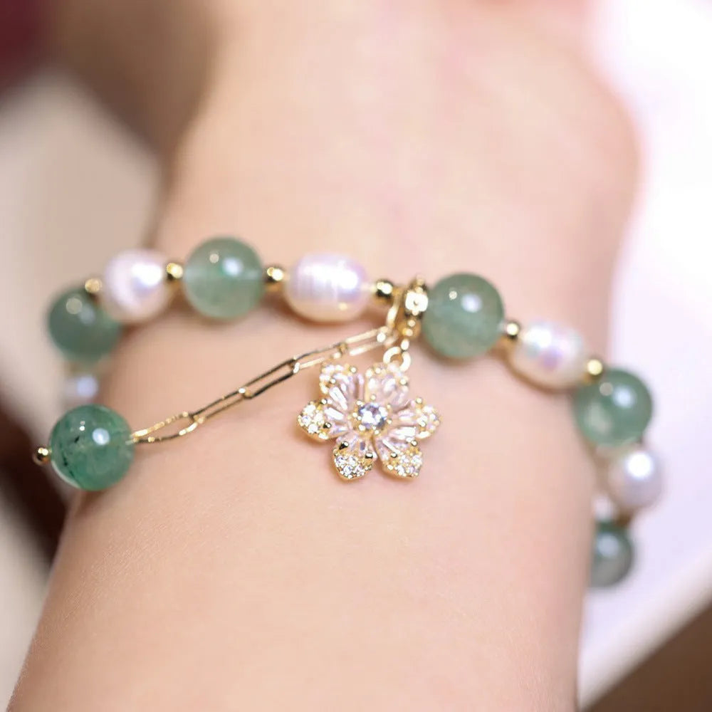 Handmade green strawberry freshwater pearl bracelet with peace buckle and hanging flower charm