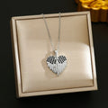 Women's non-fading titanium steel necklace with copper-plated gold heart pendant on a clavicle chain