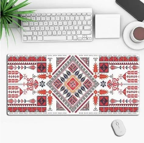 Large black anime-themed gaming mouse pad with non-slip rubber base on a wooden desk.