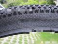 Ultralight puncture proof mountain bike tyre shown in 26, 27.5, and 29 inch sizes with black and white label sidewall options.