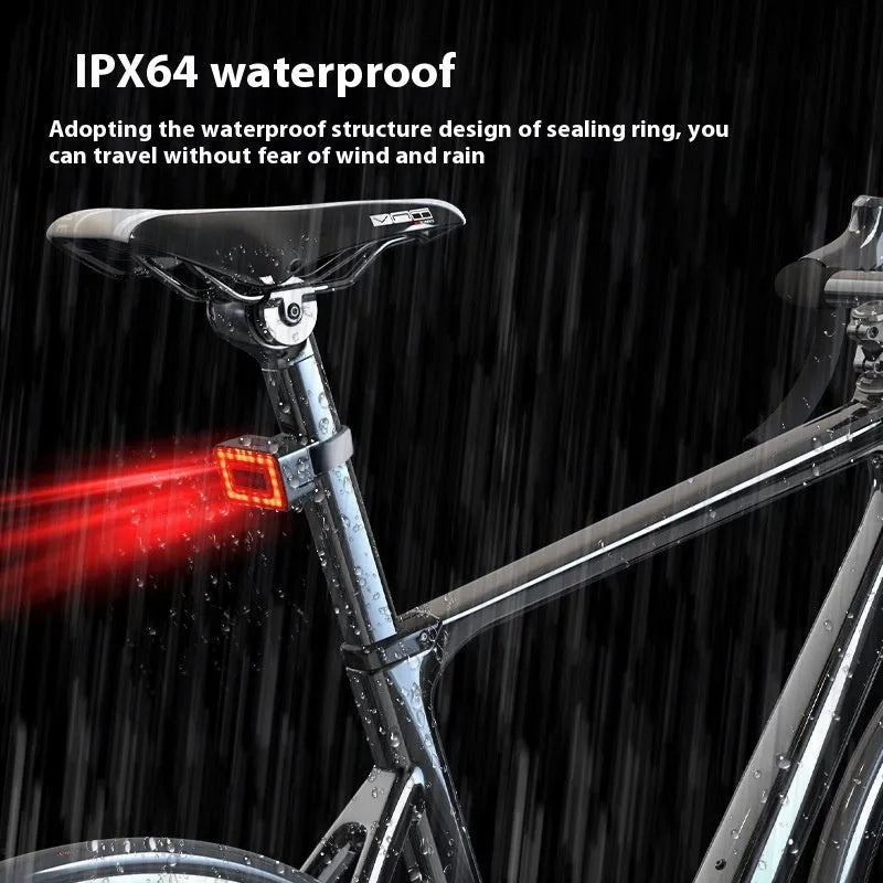 Smart radar bicycle taillight with double mounting bracket on a bike seat post, showing compact black design.