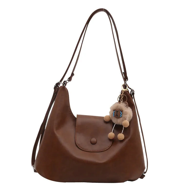 Women's horizontal square PU leather shoulder bag in urban simplicity style with single strap and internal phone pocket